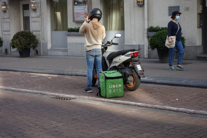 Uber Eats delivery man editorial photography. Image of eats - 168888122
