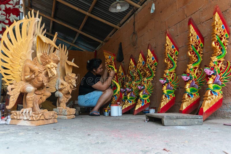 UBUD/INDONESIA-APRIL 27 2019: A Female Craftsman From Ubud Is Making