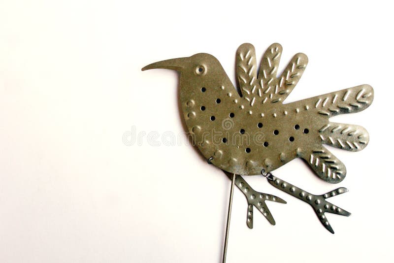 Uccello dell'ornamento del giardino durante il volo fotografie stock Uccello dell'ornamento del giardino durante il volo fotografie stock