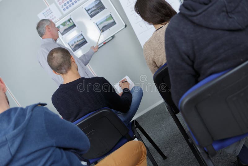 Ucznie w sala lekcyjnej obrazy stock Ucznie w sala lekcyjnej obrazy stock