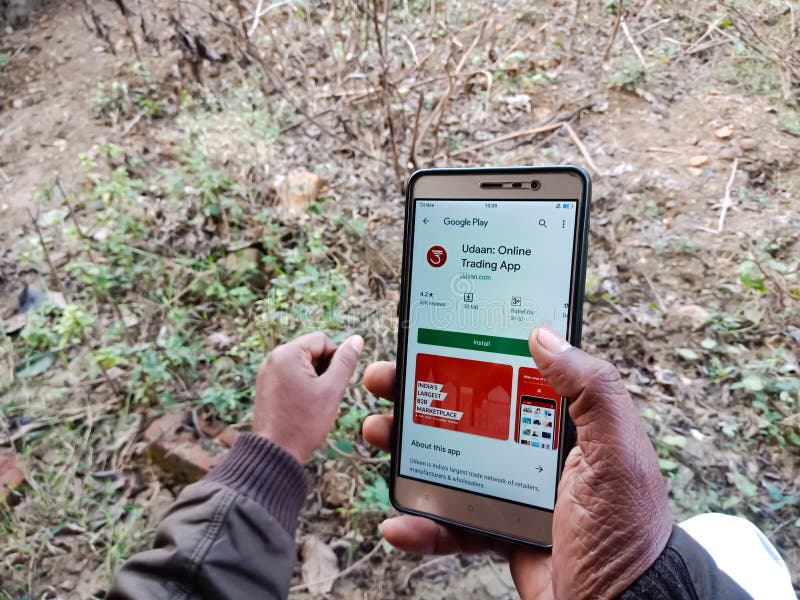 Udaan online share trading app displayed on digital screen in India dec 2019