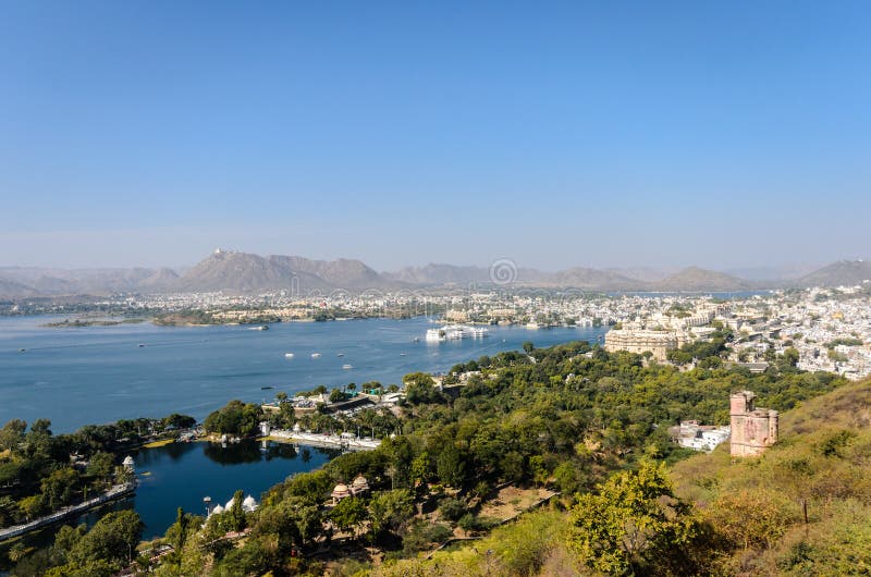 Udaipur - View of Lake Pichola, City Palace and Taj Lake Palace. Udaipur - View of Lake Pichola, City Palace and Taj Lake Palace