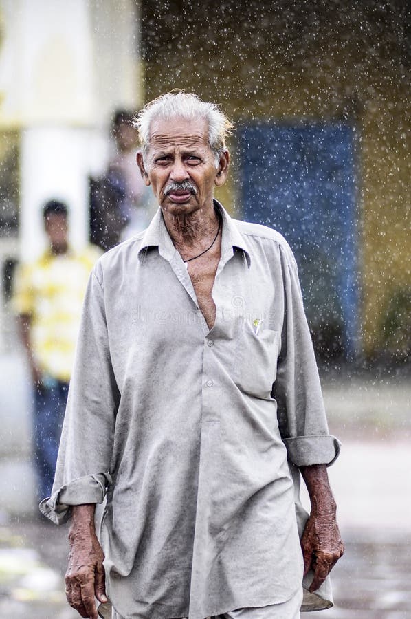 Udaipur, India, September 13, 2010: Indian Old Man Walking in Ra Editorial Stock Image - Image of hair, delhi: 93042069 Udaipur, India, September 13, 2010: Indian Old Man Walking in Ra Editorial Stock Image - Image of hair, delhi: 93042069