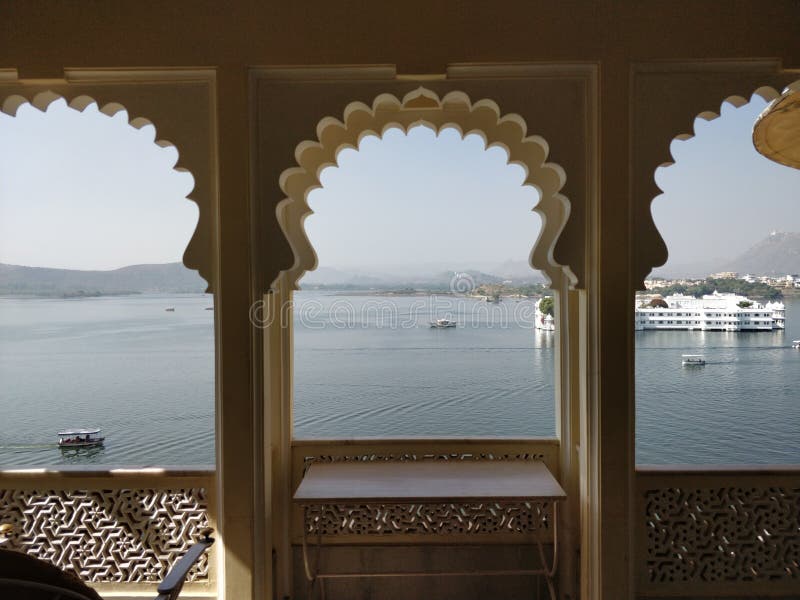 Udaipur, Rajasthan, India: 19th November 2018- A view of the Taj Lake Palace Hotel situated from City Palace royalty free stock photos Udaipur, Rajasthan, India: 19th November 2018- A view of the Taj Lake Palace Hotel situated from City Palace royalty free stock photos