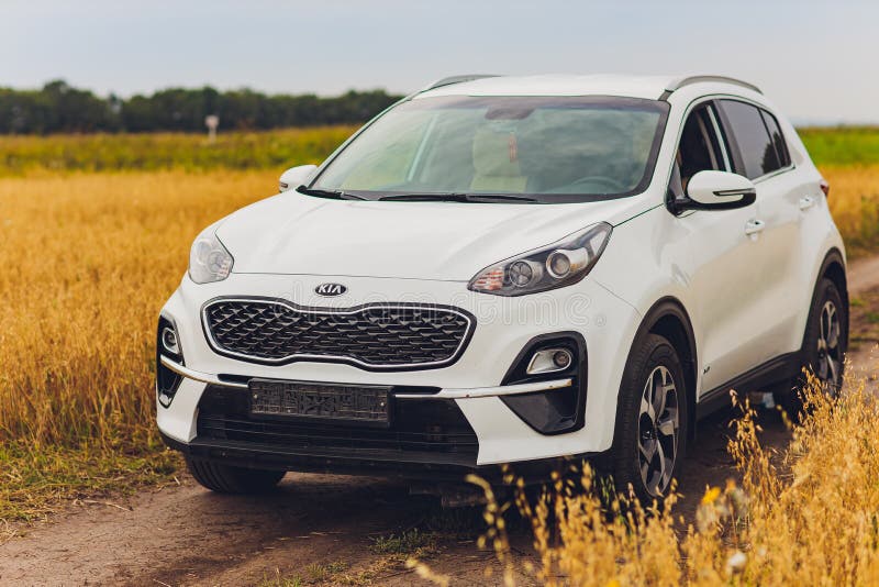 for example down God Ufa, Russia, 1 July, 2019: Car Kia Sportage 2.0 CRDI Awd or 4x4, White  Color, Parked on the Road, Next To a Large Rock Editorial Stock Photo -  Image of grass, lake: 168959523