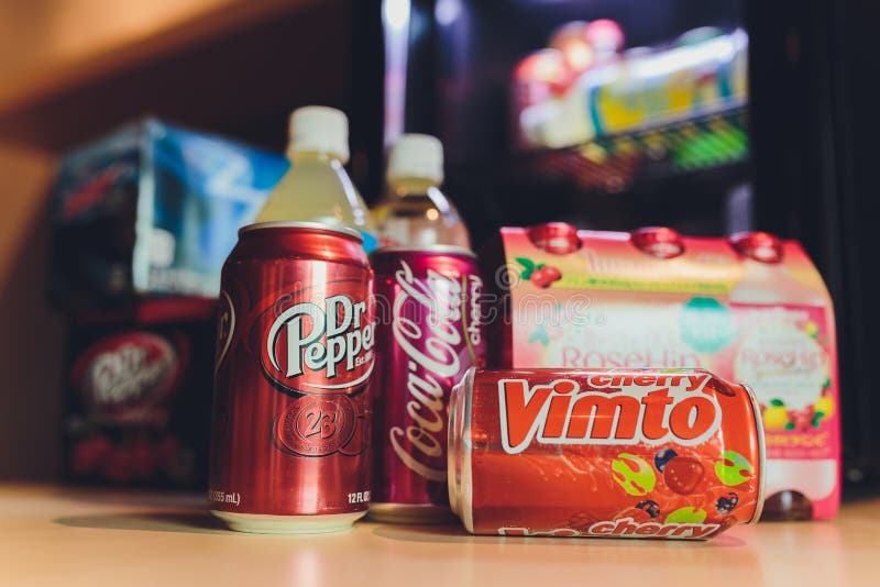 Ufa, Russia, Soda Shop, 3 July, 2019: Grocery store shelf with various brands of soda in cans. Pepsi Co is one of the