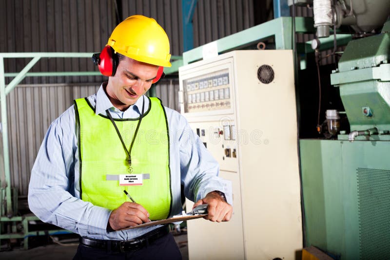 Ufficiale di sanità e sicurezza professionale fotografia stock libera da diritti Ufficiale di sanità e sicurezza professionale fotografia stock libera da diritti