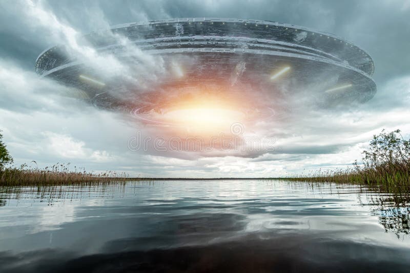 UFO, an alien saucer hovering above the lake in the clouds, hovering motionless in the sky. Unidentified flying object, alien