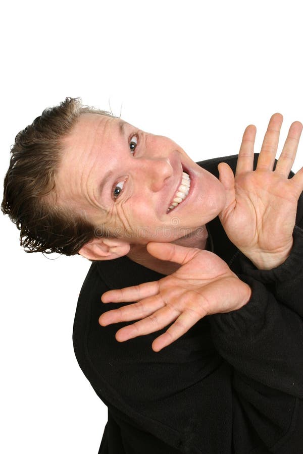 Thirty-three year old caucasian man making facial expressions over white background. Thirty-three year old caucasian man making facial expressions over white background.