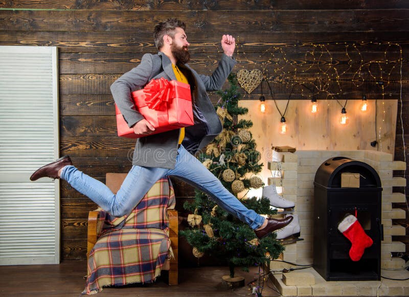 Spread happiness and joy. Bearded guy in motion jump. Delivery christmas present. Gifts delivery. Still have time. Delivery service. Christmas is coming. Man hold box hurry to deliver gift on time. Spread happiness and joy. Bearded guy in motion jump. Delivery christmas present. Gifts delivery. Still have time. Delivery service. Christmas is coming. Man hold box hurry to deliver gift on time.