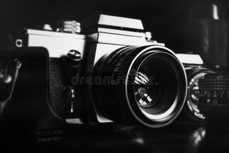 Uitstekende filmcamera's en lenzen stock afbeeldingen Uitstekende filmcamera's en lenzen stock afbeeldingen