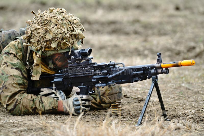 UK Military with semiautomatic rifle in Romanian military polygon royalty free stock image UK Military with semiautomatic rifle in Romanian military polygon royalty free stock image