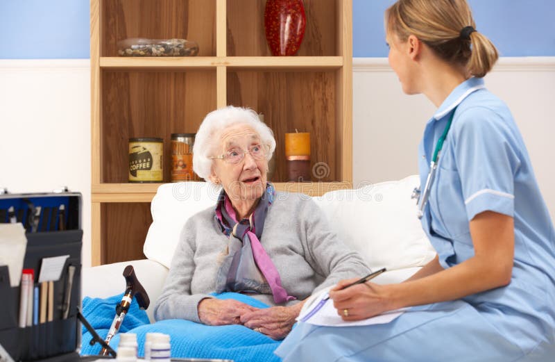 UK Nurse Visiting Senior Woman at Home Stock Photo - Image of male