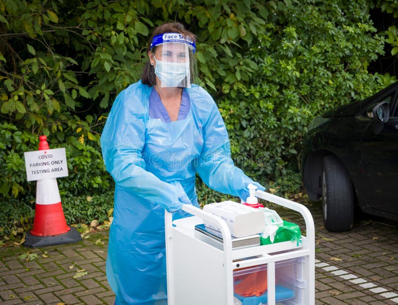 UK nurse wearing PPE gear at Coronavirus testing centre