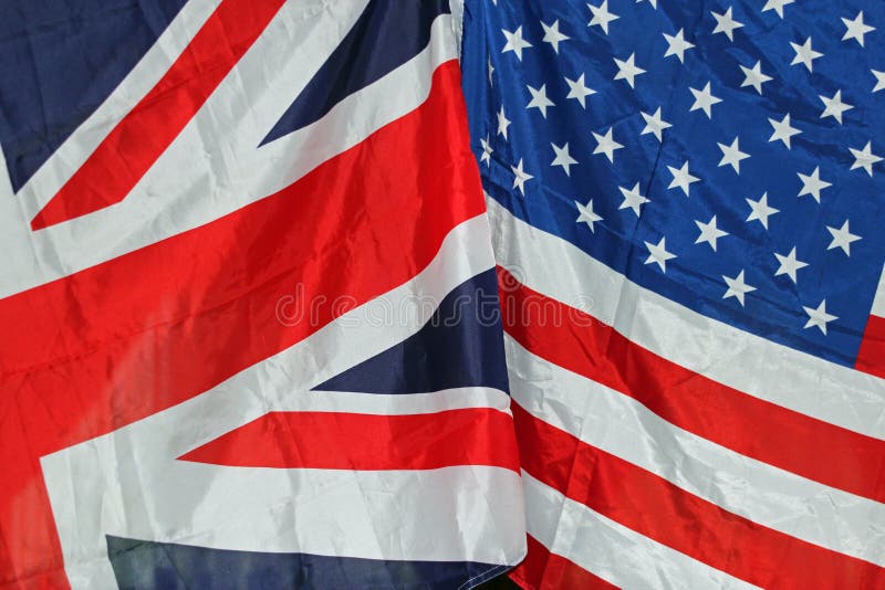 UK and US flags together symbolizing coalition, peace and joint forces. UK and US flags together symbolizing coalition, peace and joint forces