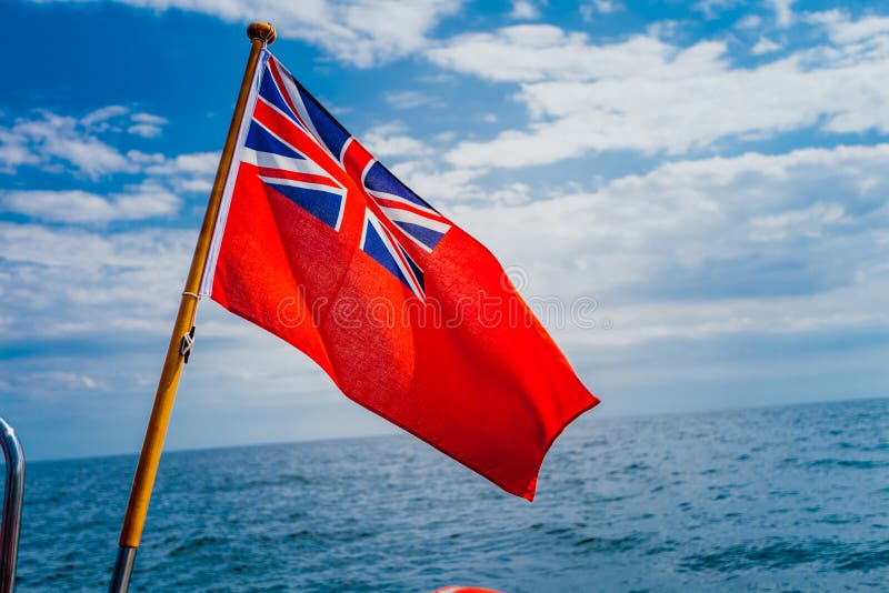 Uk red ensign the british maritime flag flown from yacht