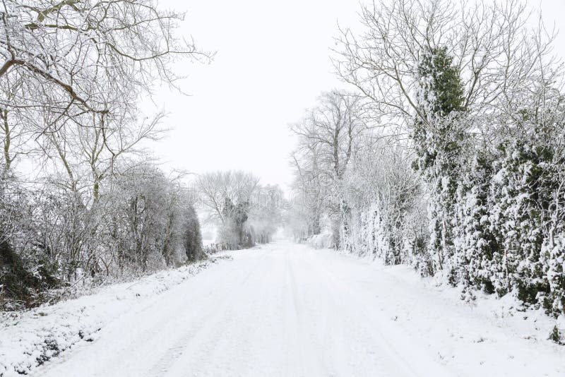 UK rural road with snow in winter