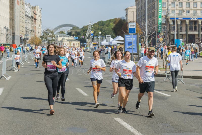 Ukraine, Kiev, Ukraine 09.09.2018 athletes and amateurs are running. People are engaged in running. Promotion of healthy stock image Ukraine, Kiev, Ukraine 09.09.2018 athletes and amateurs are running. People are engaged in running. Promotion of healthy stock image