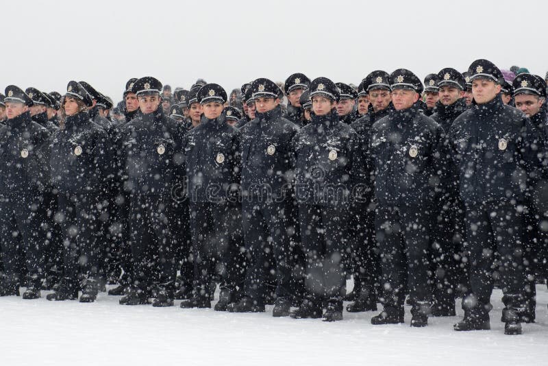 Ukraine police officers. New police officers take an oath before the start working in a new police department. Dnipropetrovsk City, Ukraine. January 17, 2016 stock image Ukraine police officers. New police officers take an oath before the start working in a new police department. Dnipropetrovsk City, Ukraine. January 17, 2016 stock image
