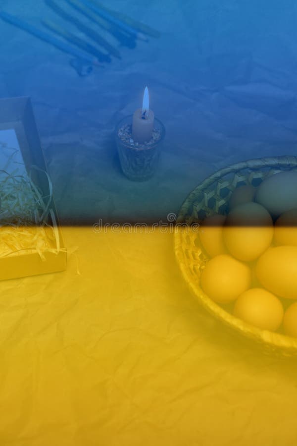 Ukrainian Candle with Light. Rustic Background. Tools for Decorating Paschal Eggs, Pysankas