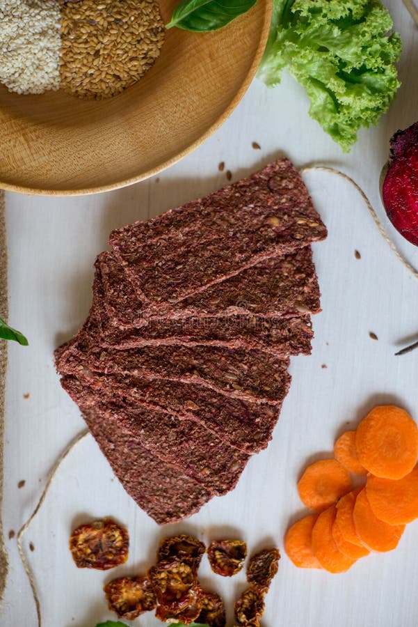 Ukrainian Crispbread with beetroot and tomato. Healthy diet food. Bread cakes on a white background in the ingredient seasoning stock images Ukrainian Crispbread with beetroot and tomato. Healthy diet food. Bread cakes on a white background in the ingredient seasoning stock images