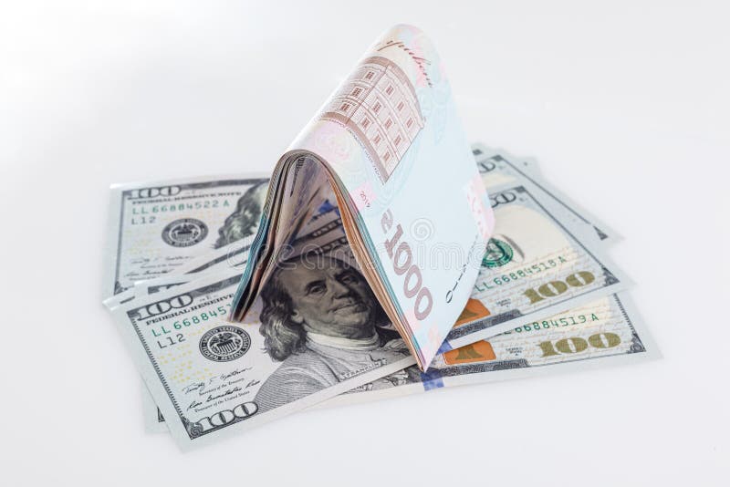 Ukrainian money - hryvnia banknotes USA dollars bills. Finance in Ukraine, of the hryvnia to the dollar exchange rate. Close-up. Ukrainian money - hryvnia royalty free stock images Ukrainian money - hryvnia banknotes USA dollars bills. Finance in Ukraine, of the hryvnia to the dollar exchange rate. Close-up. Ukrainian money - hryvnia royalty free stock images