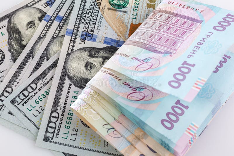 Ukrainian money - hryvnia banknotes USA dollars bills. Finance in Ukraine, of the hryvnia to the dollar exchange rate. Close-up. Ukrainian money - hryvnia royalty free stock images Ukrainian money - hryvnia banknotes USA dollars bills. Finance in Ukraine, of the hryvnia to the dollar exchange rate. Close-up. Ukrainian money - hryvnia royalty free stock images