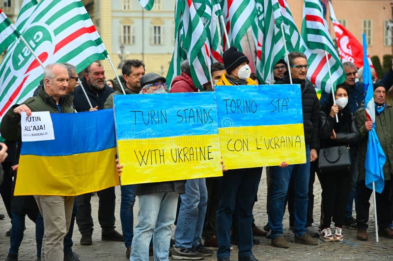Ukrainian refugees participate in the European public protest against the Russian military invasion