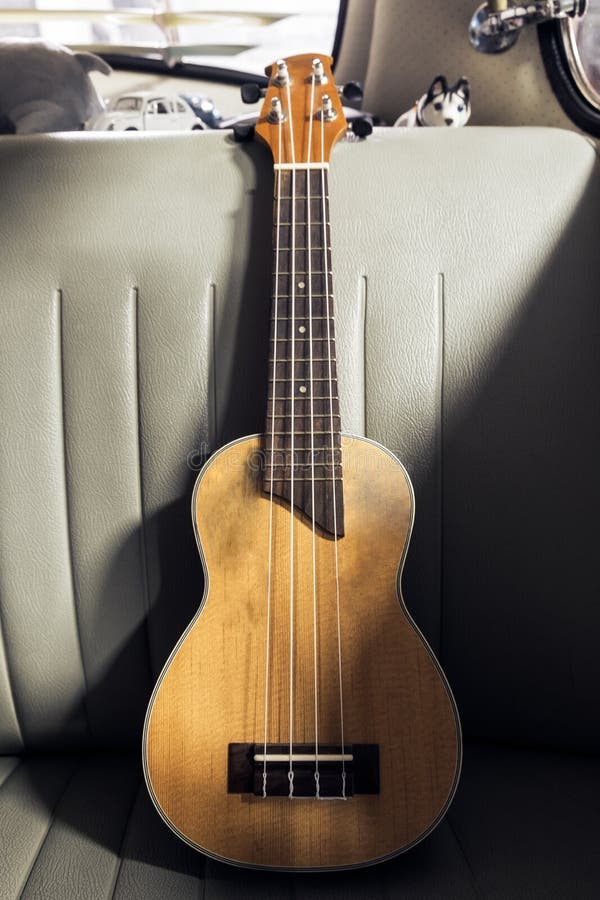 Ukulele on Seat Vintage Car Stock Image Image of chordophone