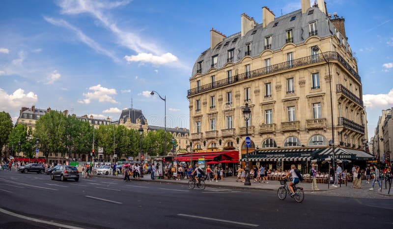 Paris, France - August 1, 2018: Beautiful old buildings in the Latin Quarter along the South Bank of the Siene River. Paris, France - August 1, 2018: Beautiful old buildings in the Latin Quarter along the South Bank of the Siene River.