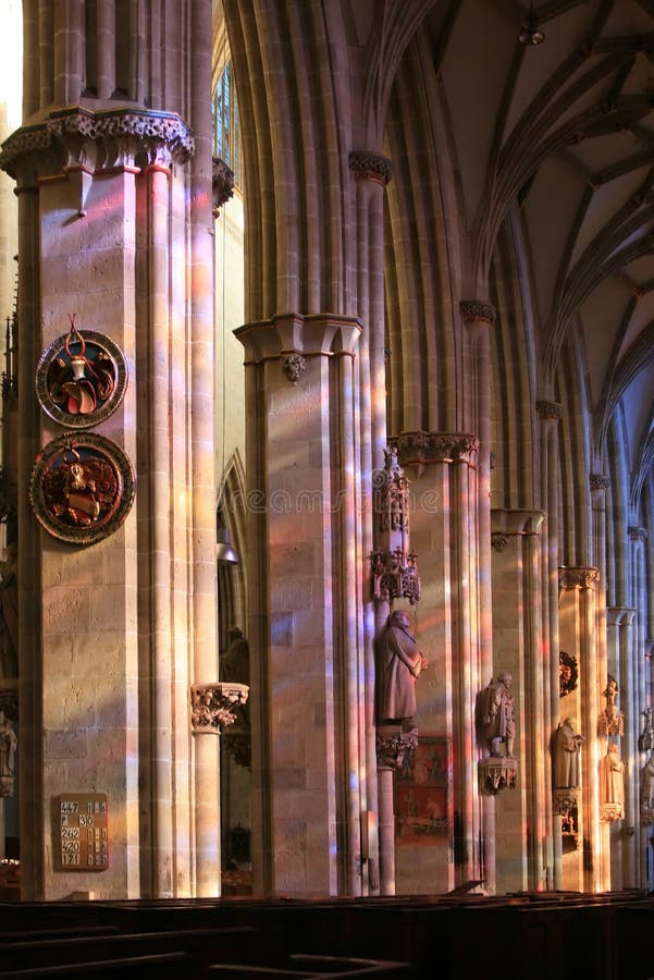 Ulm cathedral interior with stained glass light. Ulm cathedral interior with stained glass light