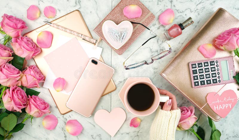 Ultra feminine pink desk workspace with rose gold accessories flatlay. Ultra feminine pink desk workspace with rose gold accessories on white marble background royalty free stock photos Ultra feminine pink desk workspace with rose gold accessories flatlay. Ultra feminine pink desk workspace with rose gold accessories on white marble background royalty free stock photos