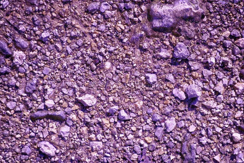 Ultra purple Ground like on Mars, land texture, sand surface, stone background stock photos