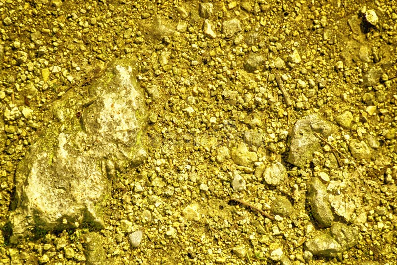 Ultra yellow Ground like on Mars, land texture, sand surface, stone background royalty free stock photos