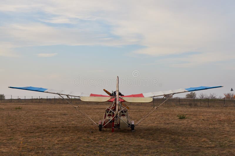 Air Propeller of the Ultralight Aircraft Standing on Airfield, Closeup