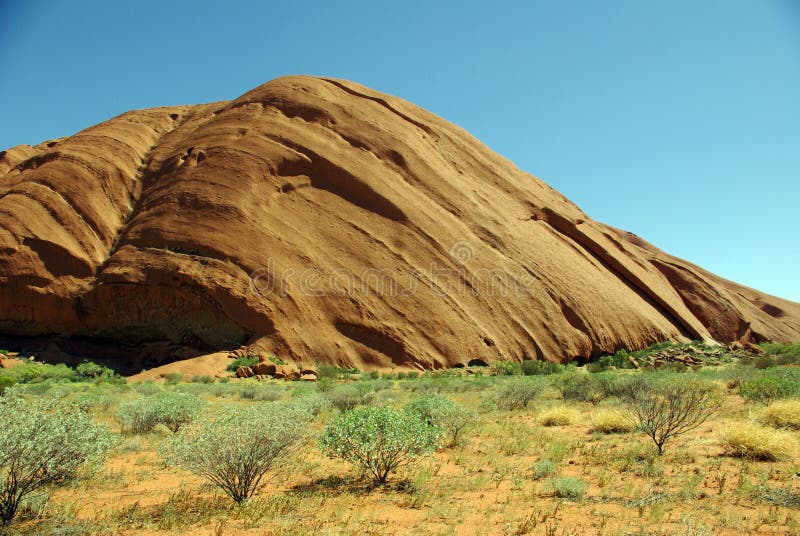 Uluru (Ayers Rock) - the world's largest monolith and an Aboriginal sacred site, Australia. Uluru (Ayers Rock) - the world's largest monolith and an Aboriginal sacred site, Australia.