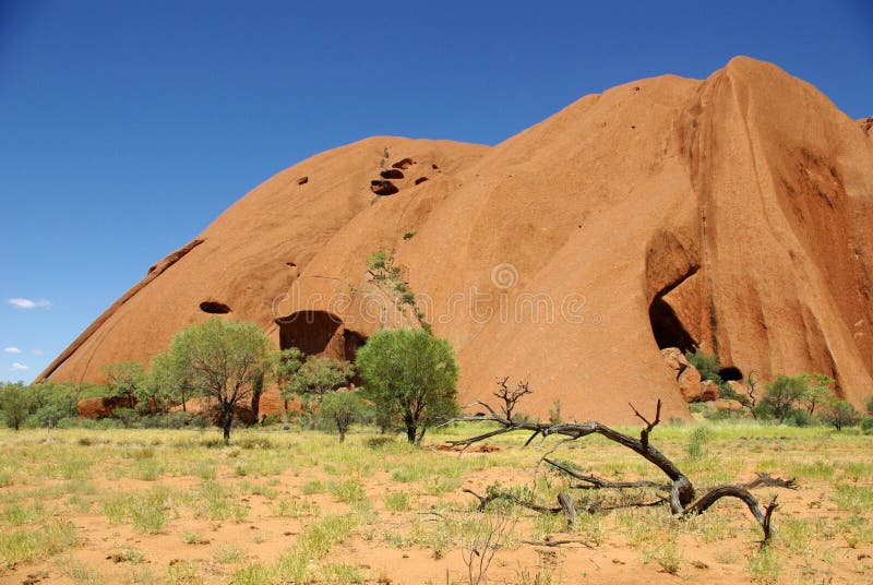 Uluru (Ayers Rock) - the world's largest monolith and an Aboriginal sacred site, Australia. Uluru (Ayers Rock) - the world's largest monolith and an Aboriginal sacred site, Australia.