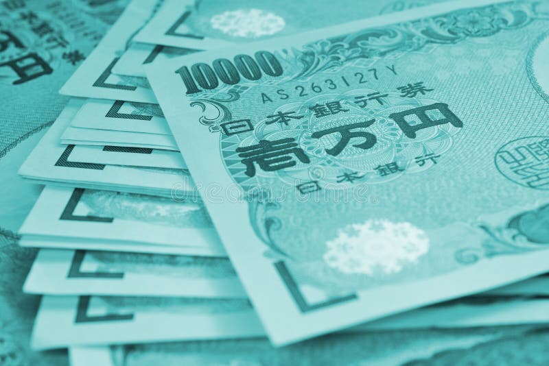 A field of 10000 yen Japanese notes. Tinted turquoise or aquamarine background with low contrast. A heap of banknotes. Backdrop on the theme of banks, finance and the economy of Japan. Macro. A field of 10000 yen Japanese notes. Tinted turquoise or aquamarine background with low contrast. A heap of banknotes. Backdrop on the theme of banks, finance and the economy of Japan. Macro