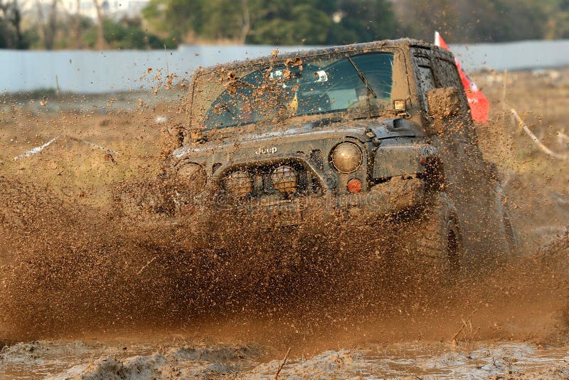 Splashes of muddy water, bumpy roads, fast moving tires. Splashes of muddy water, bumpy roads, fast moving tires