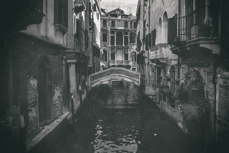 A glimpse of a Canal in Venice an antique photo to connote a concept of ancient culture and tourism history. A glimpse of a Canal in Venice an antique photo to connote a concept of ancient culture and tourism history