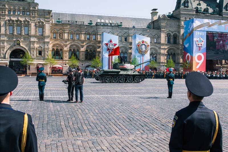 A Russian T34 tank drives through Red Square in Moscow. Victory parade on May 9: Moscow, Russia, 09 may 2019. A Russian T34 tank drives through Red Square in Moscow. Victory parade on May 9: Moscow, Russia, 09 may 2019.