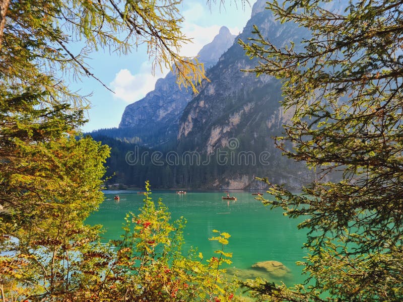 Beautiful autumnal glimpse of the typical green of Lake Braies Trentino South Tyrol. Beautiful autumnal glimpse of the typical green of Lake Braies Trentino South Tyrol