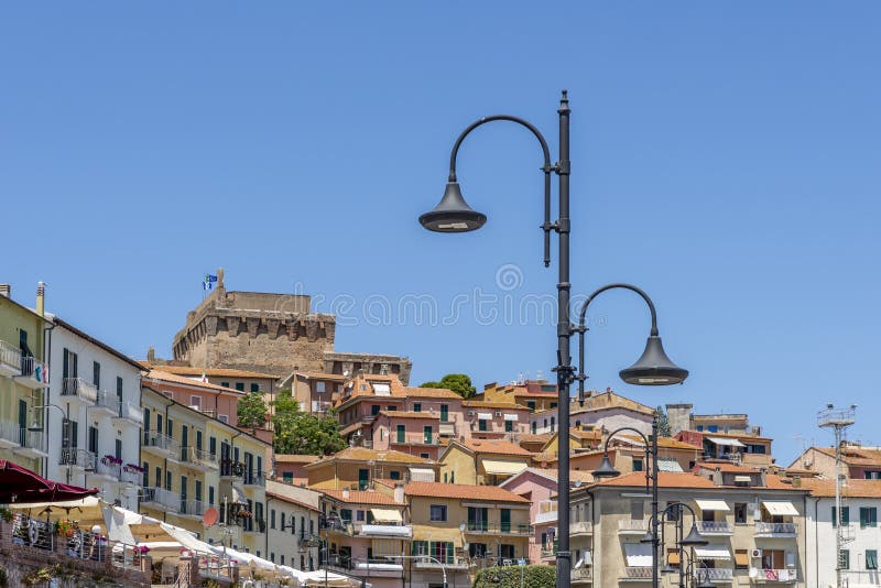 A glimpse of the historic center of Porto Santo Stefano, Grosseto, Italy, Europe, on a sunny day. A glimpse of the historic center of Porto Santo Stefano, Grosseto, Italy, Europe, on a sunny day