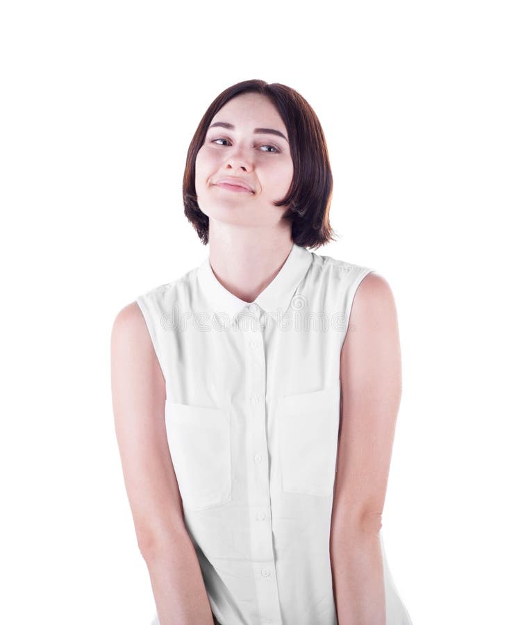Uma jovem mulher bonita isolada em um fundo branco Uma menina atrativa e brincalhão Uma senhora ocasional bonito que veste uma bl imagem de stock royalty free Uma jovem mulher bonita isolada em um fundo branco Uma menina atrativa e brincalhão Uma senhora ocasional bonito que veste uma bl imagem de stock royalty free