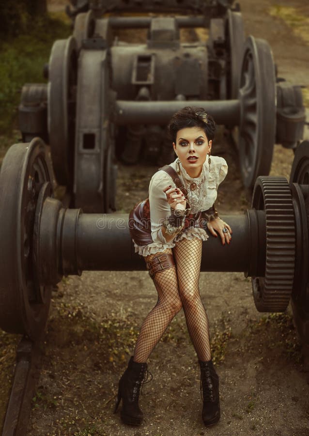 Uma menina ao estilo do steampunk foto de stock royalty free Uma menina ao estilo do steampunk foto de stock royalty free
