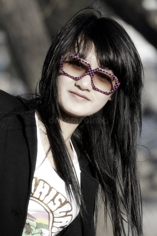 Uma menina oriental fotografia de stock Uma menina oriental fotografia de stock