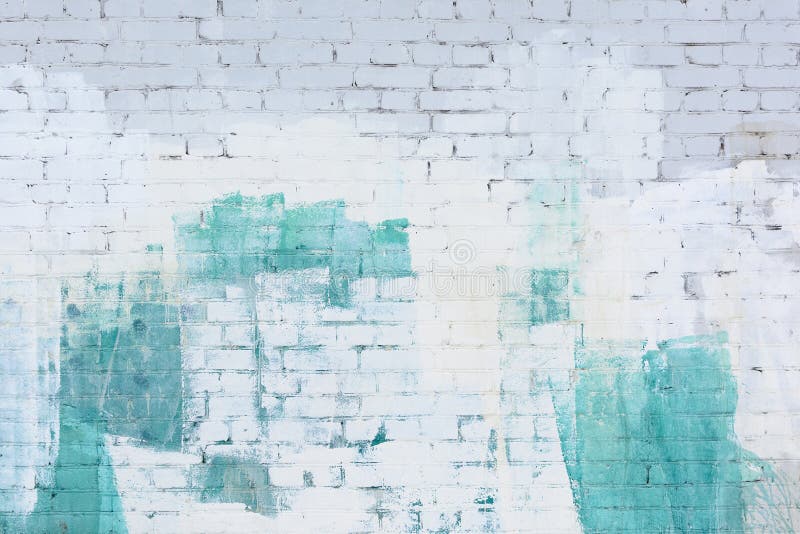 Uma parede de tijolo pintou o sumário com branco e pintura de turquesa Fundo, textura