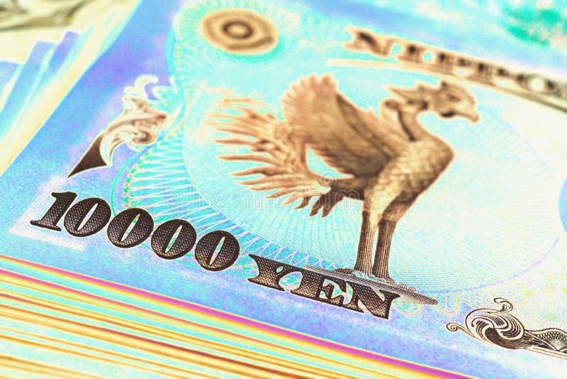 A pile of 10000 yen Japanese banknotes. The reverse of the banknote with the image of the Phoenix bird close-up. Vivid tinted illustration about money and the economy of Japan. Macro. A pile of 10000 yen Japanese banknotes. The reverse of the banknote with the image of the Phoenix bird close-up. Vivid tinted illustration about money and the economy of Japan. Macro