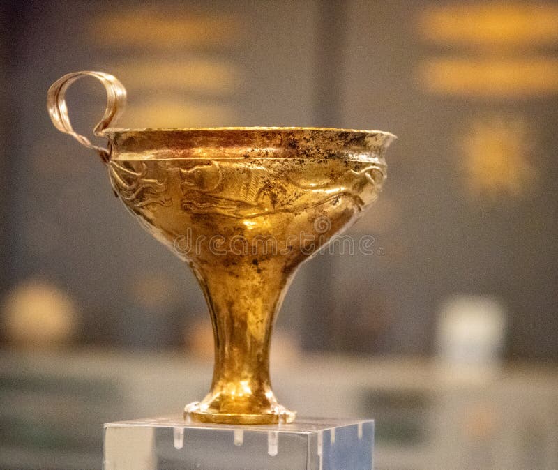 A Mycenean Gold Cup on display in the National Archaeological Museum in Athens, Greece. A Mycenean Gold Cup on display in the National Archaeological Museum in Athens, Greece