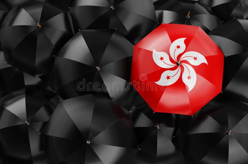 Umbrella with Hong Kong Flag among Black Umbrellas, 3D Rendering Stock
